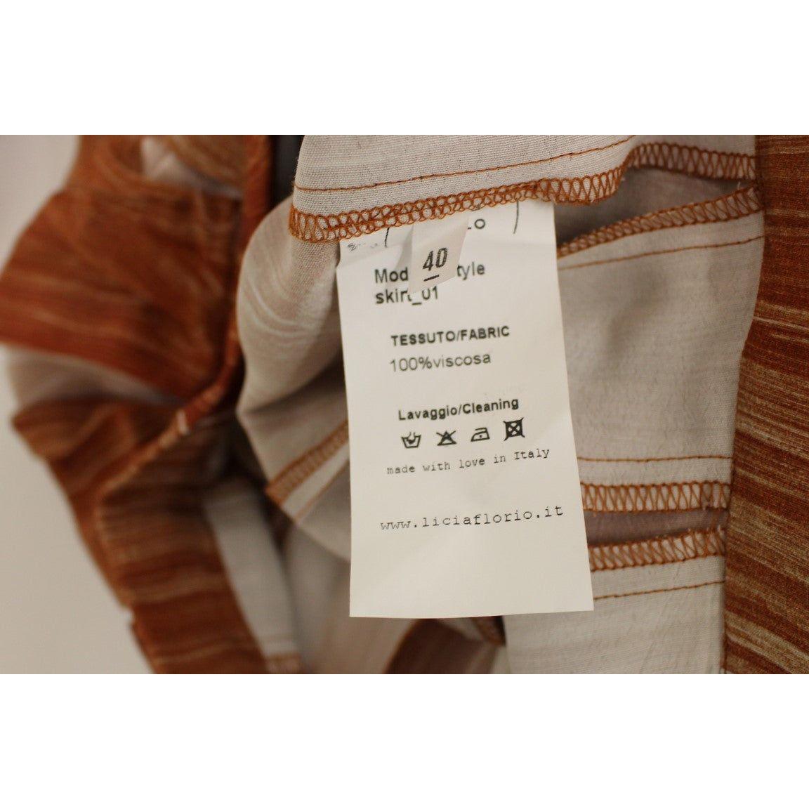 تنورة أنيقة باللون البرتقالي والبني من Licia Florio أسفل الركبة