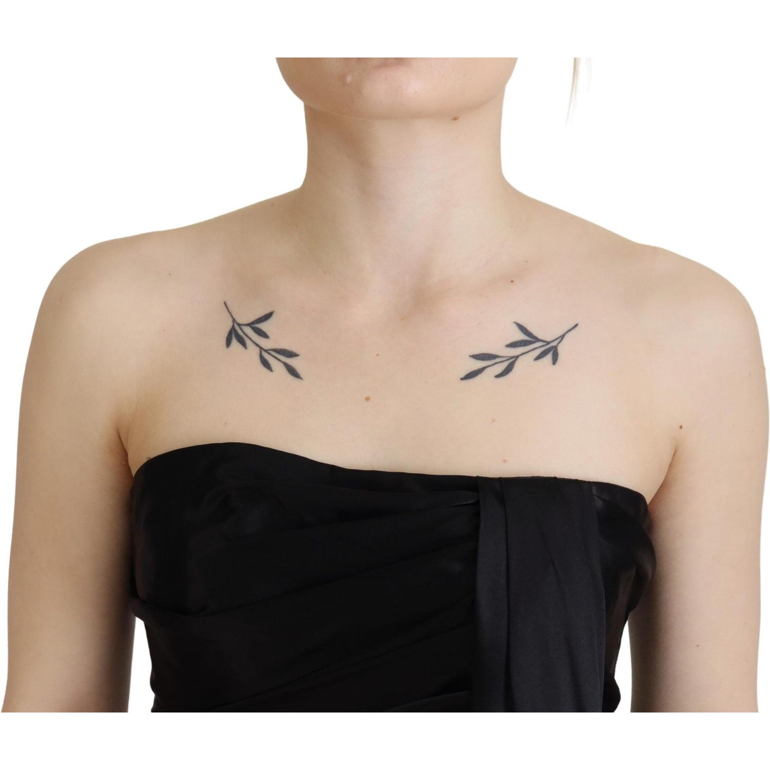 فستان دولتشي آند غابانا الأنيق المصنوع من الحرير الأسود بدون أكمام