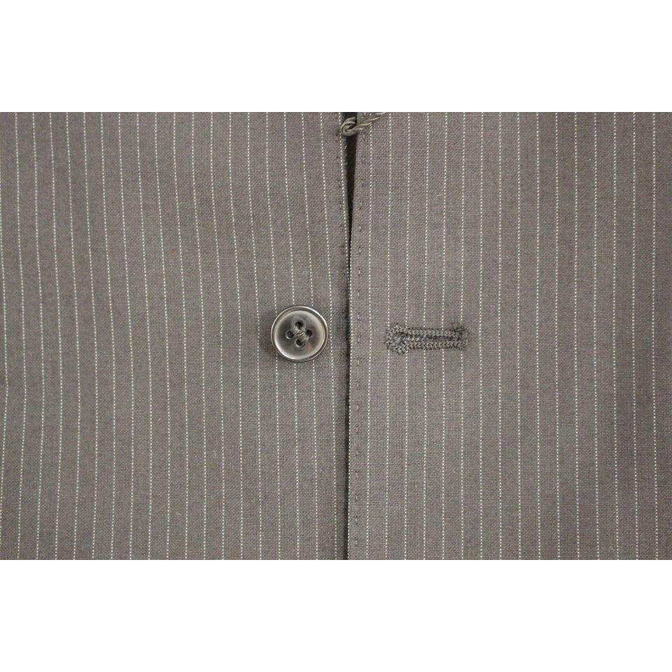 فستان من الصوف المخطط باللون الأسود من دولتشي آند غابانا