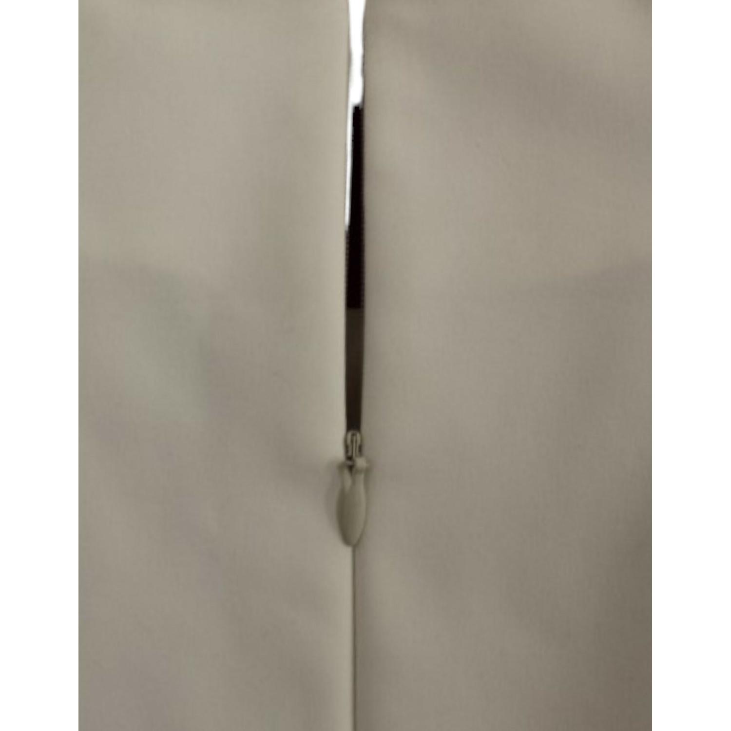 فستان روبوتي أنيق باللونين الأبيض والوردي من CO|TE