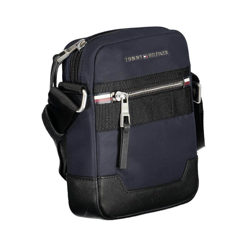 Front view with bag zipped and handles upright.