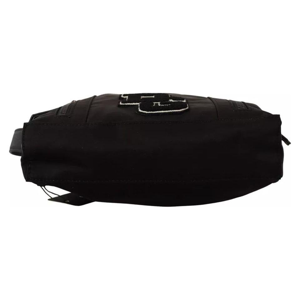 حقيبة كروس بودي من دولتشي آند غابانا مصنوعة من جلد النايلون الأسود ومزينة بشعار DG