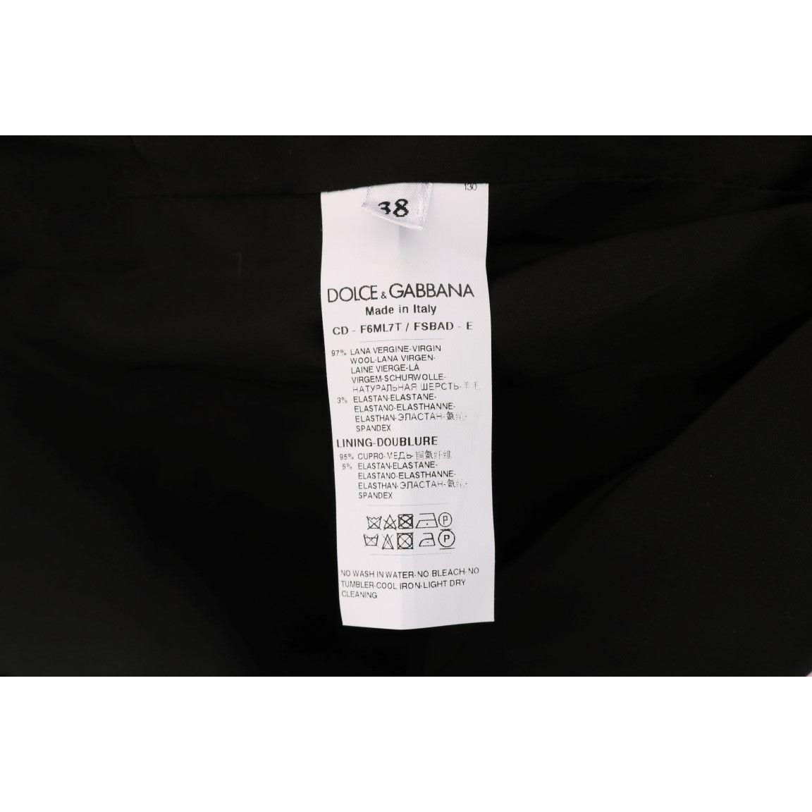 فستان من مزيج الصوف من دولتشي آند غابانا بتصميم منقط أنيق