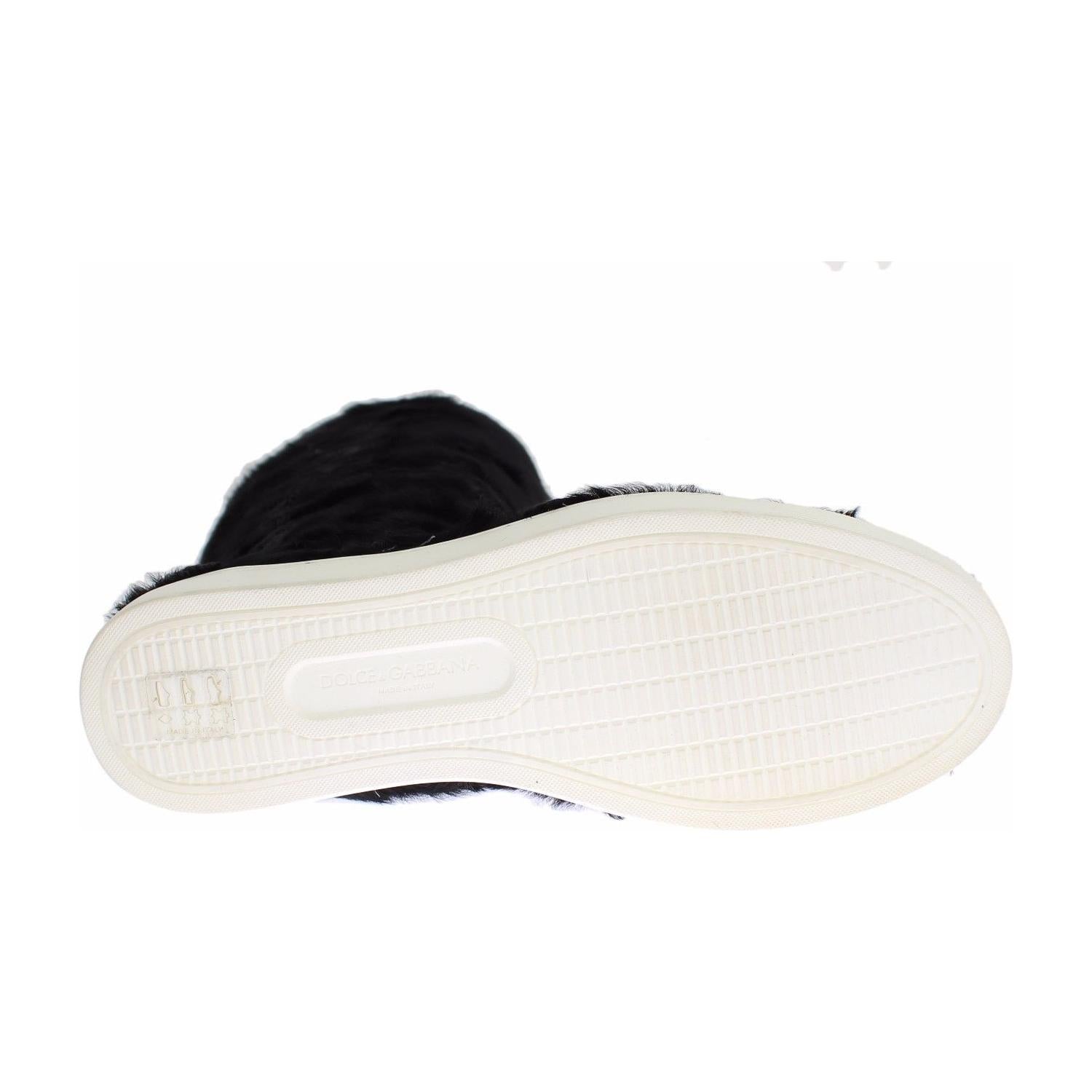 حذاء رياضي مسطح أنيق من الجلد الأسود من دولتشي آند غابانا