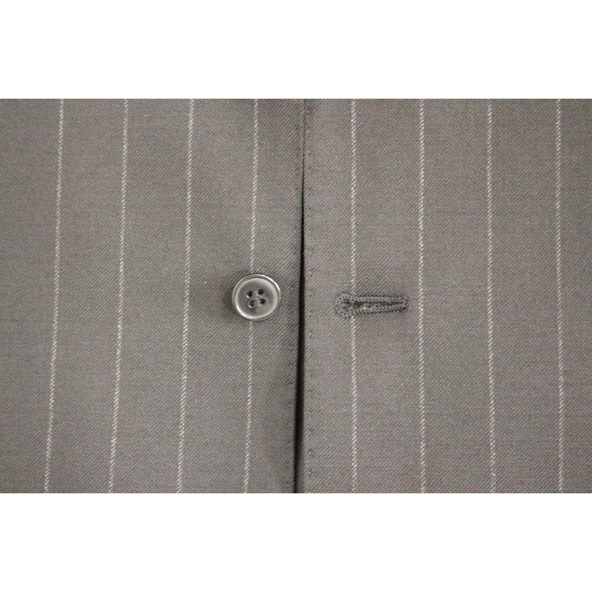 فستان من الصوف المخطط باللون الأسود من دولتشي آند غابانا