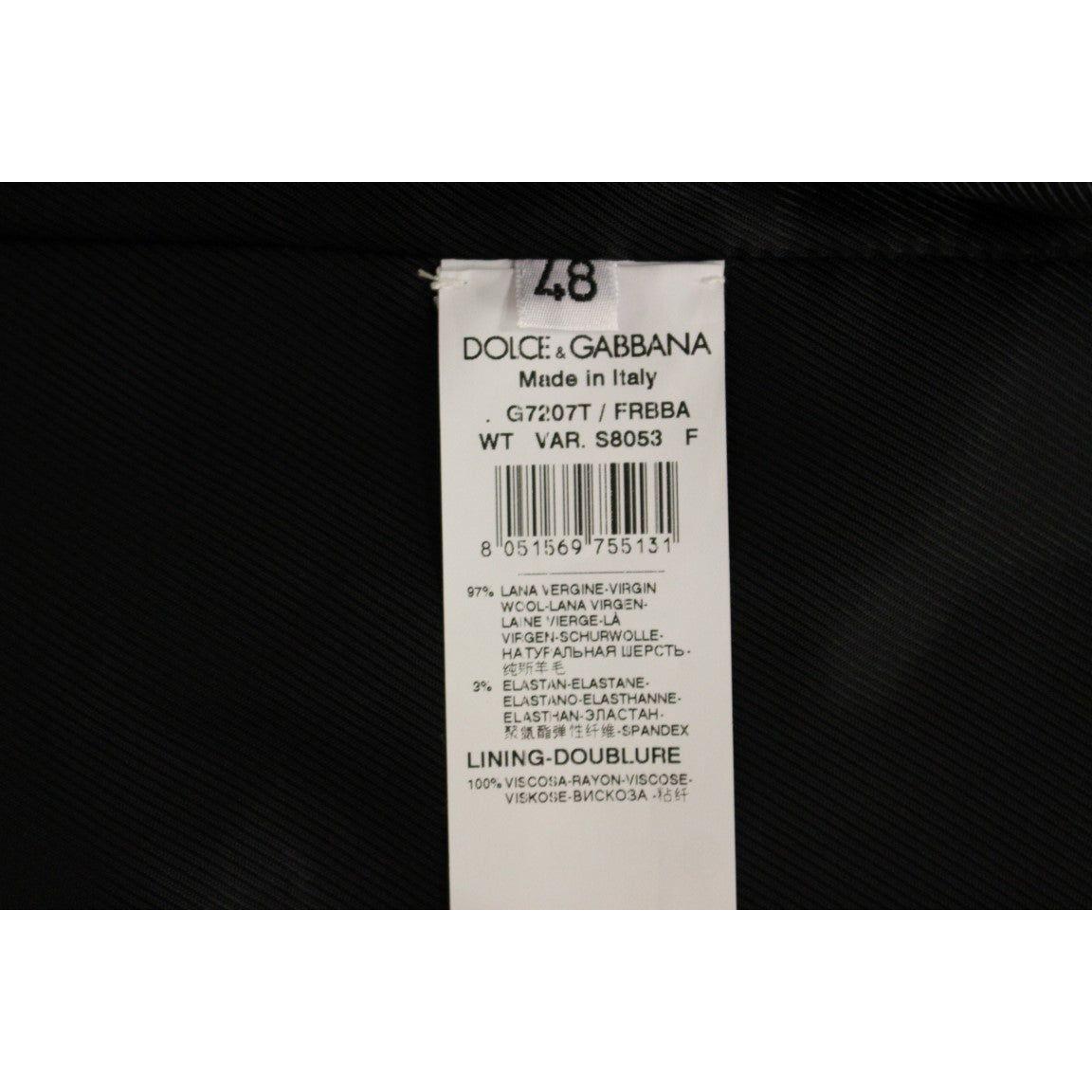 فستان من الصوف المخطط باللون الأسود من دولتشي آند غابانا