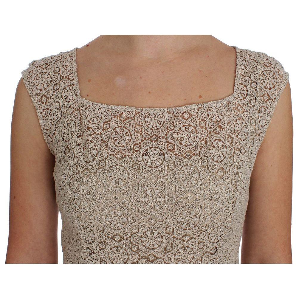 فستان ماكسي أنيق باللون البيج من دولتشي آند غابانا مع فتحة زهور