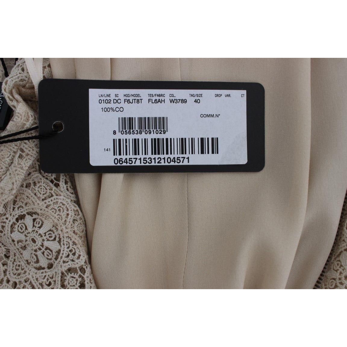 فستان ماكسي أنيق باللون البيج من دولتشي آند غابانا مع فتحة زهور