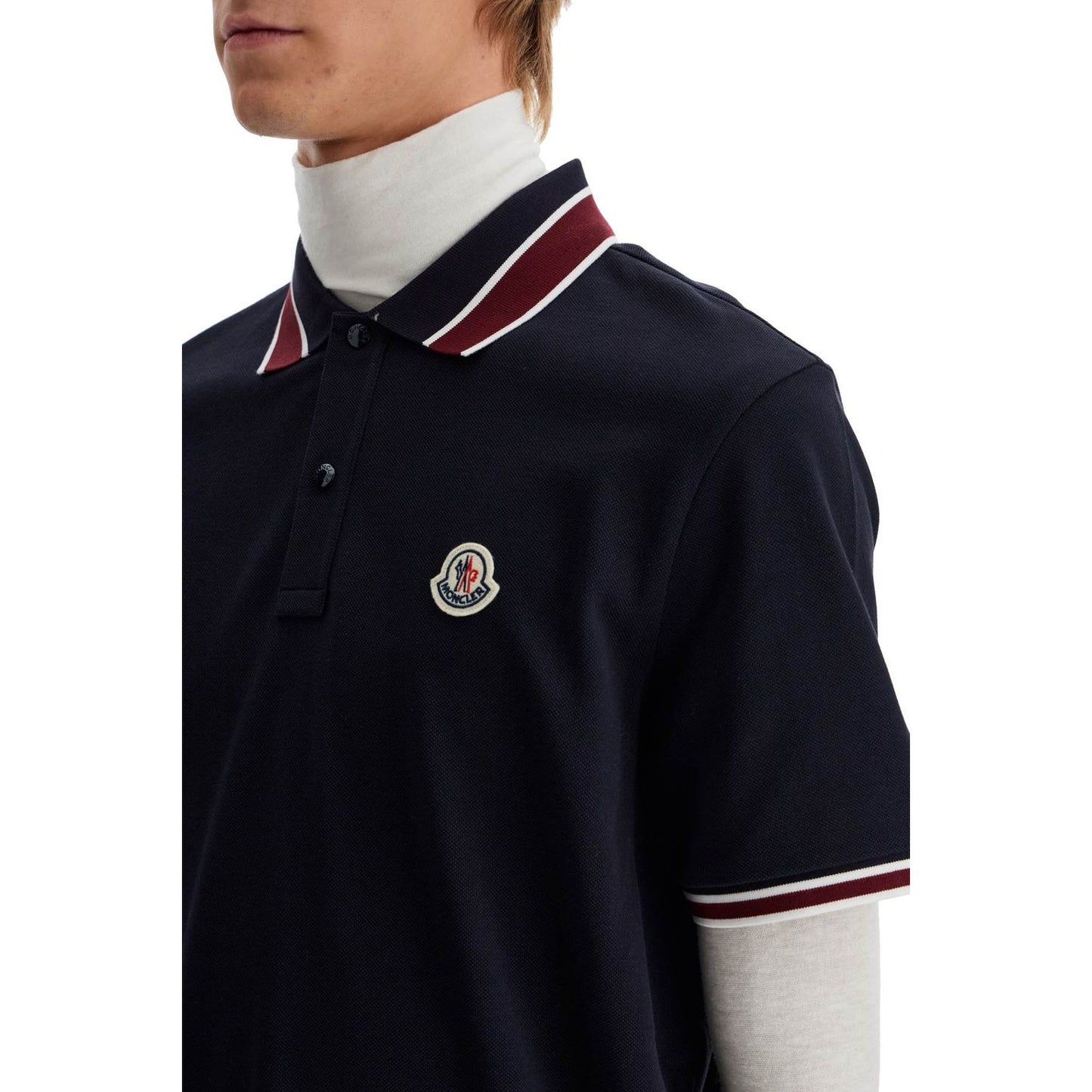 Moncler striped polo shirt with detailed accents Topwear Moncler